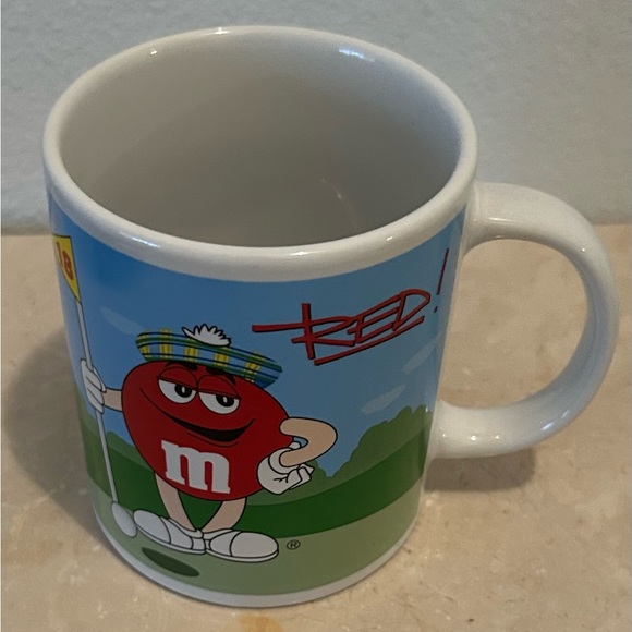 M&M Blue Football/Red Golf Mug - Picture 2 of 5